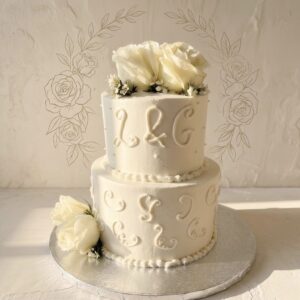 White Wedding Cake With White Flowers