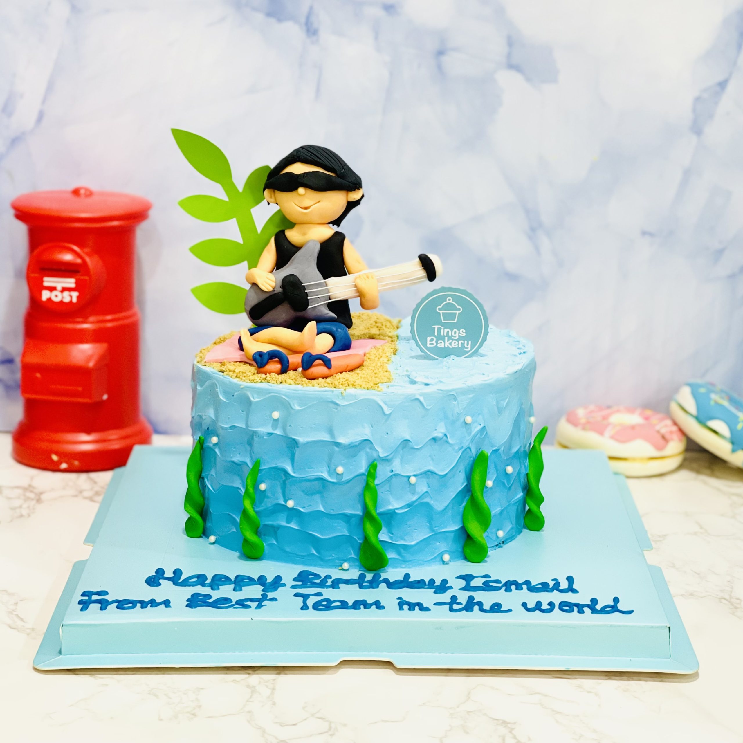 Man Playing Guitar By The Seaside Cake